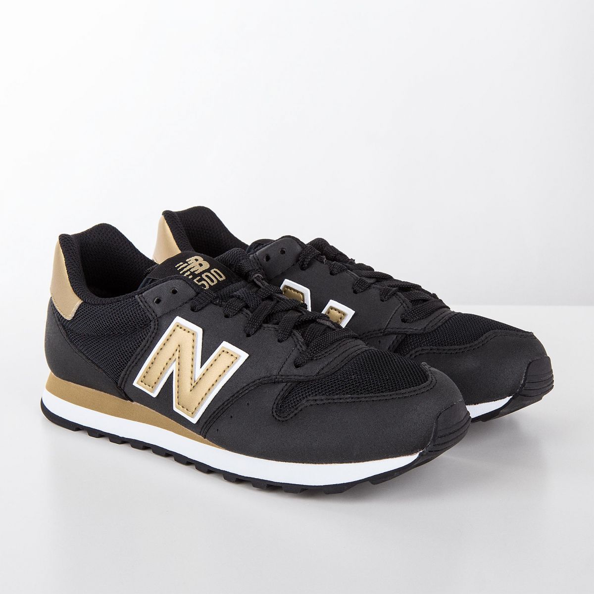 Basket new balance femme noir et or online